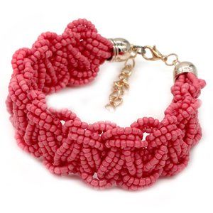 Bracelet made of coral seed beads and gold chain.